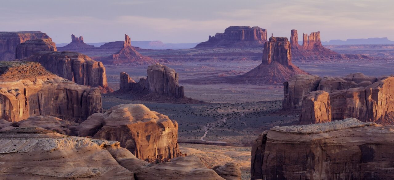 Monument Valley from Hunt's Mesa at sunrise, Arizona.