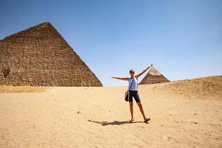 Egypt Giza Pyramids Woman IStock 1016115852 768x512 