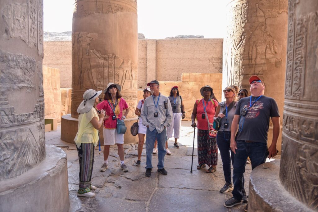 Our Tour Director shares the history of an ancient Egyptian site with smarTours travelers in spring 2023