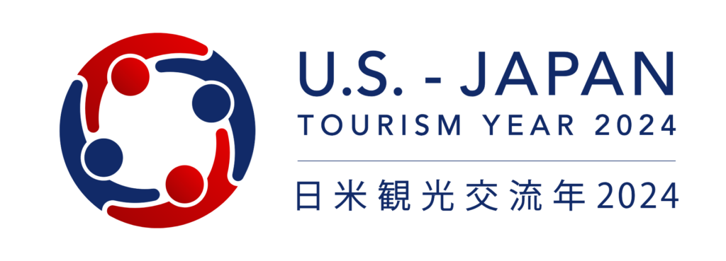 Logo for U.S.-Japan Tourism Year 2024. Features a red and blue circular design with people figures around it. Text includes "U.S.-Japan Tourism Year 2024" and the same phrase in Japanese below.